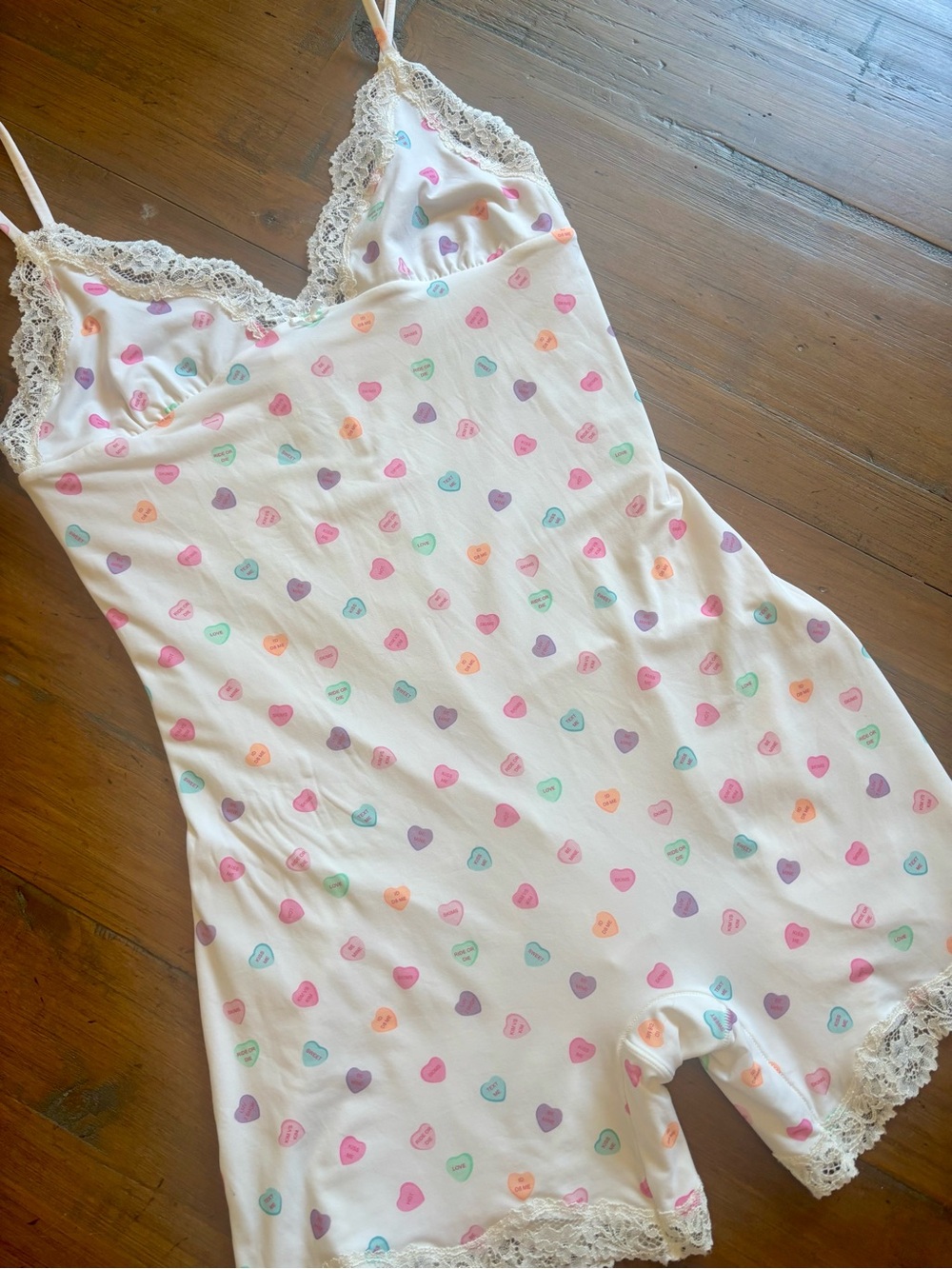 Skims candy hearts romper with lace trim